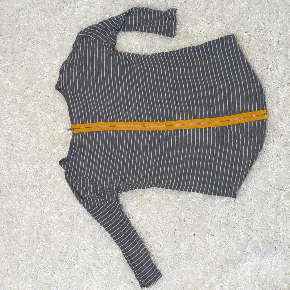 Gray and white striped 3/4 sleeve blouse with zipper detail on back